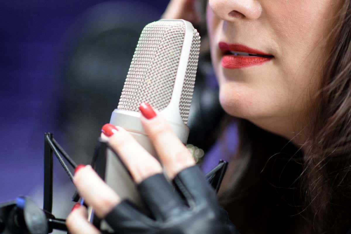 W39GEN Aubing, Germany. Dea Levina, Mental Domina, breathes into a microphone in a recording studio. Dea Levina takes up erotic audio books in the ASMR style (Autonomous Sensory Meridian Response), which are supposed to trigger a tingling sensation in the recipients. Credit: Matthias Balk/dpa/Alamy Live News