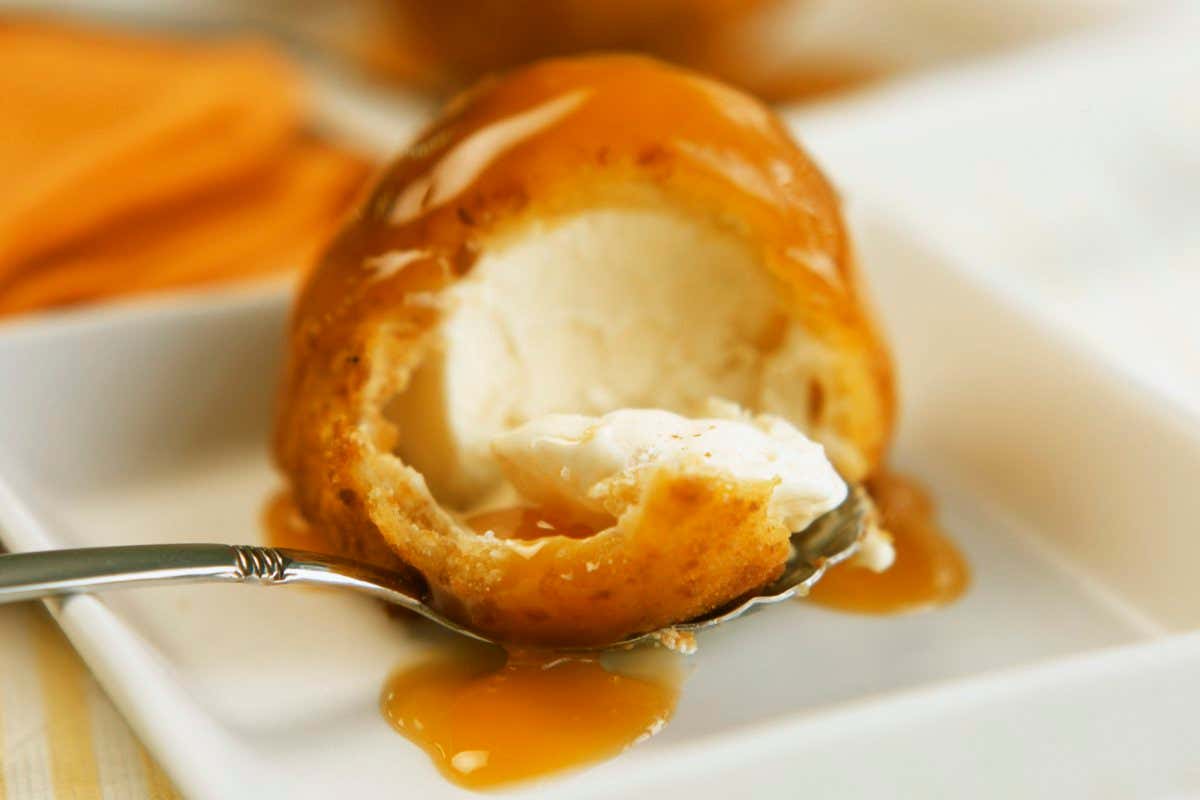 Deep-fried ice cream with caramel sauce