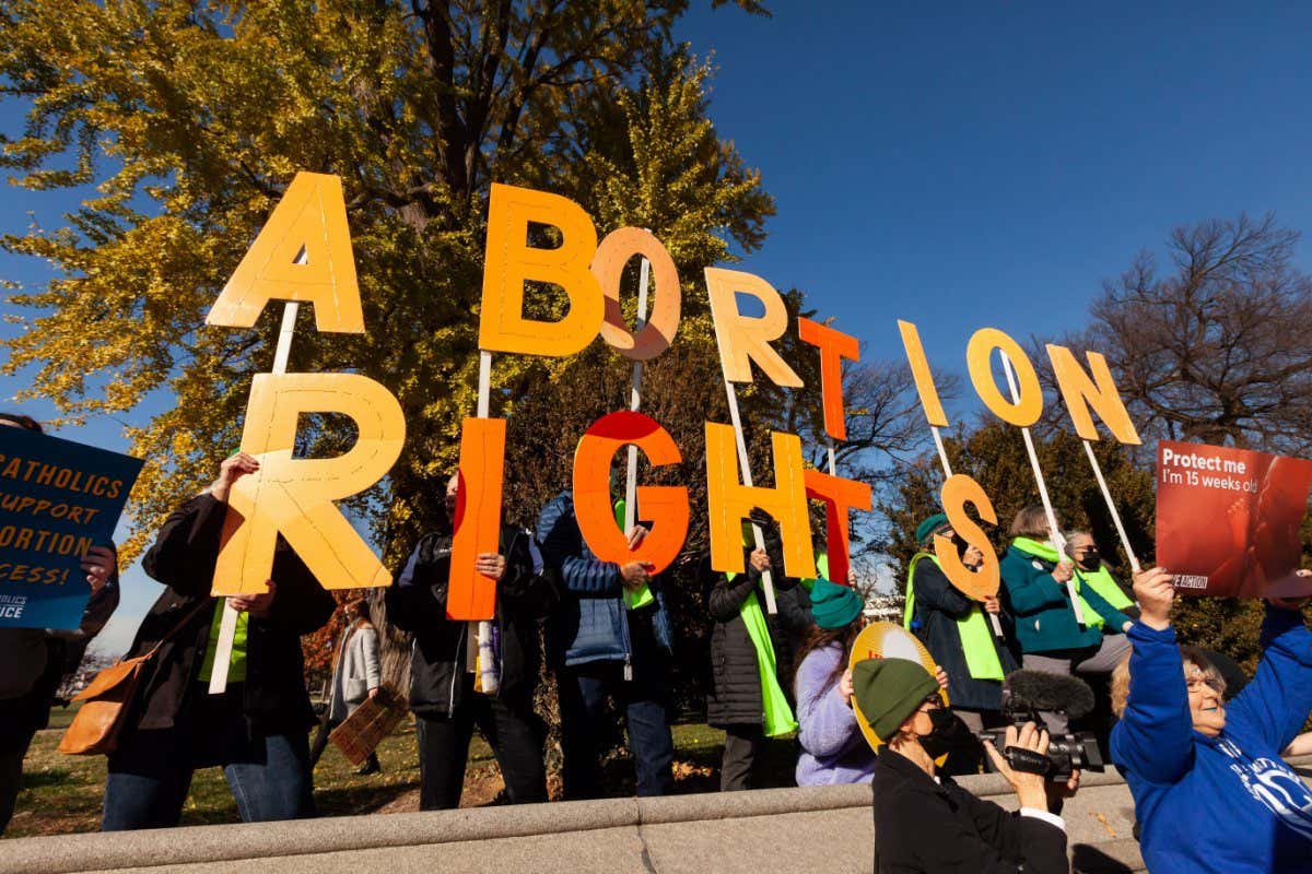 Mandatory Credit: Photo by Allison Bailey/Shutterstock (12626939f) Members of Herndon Reston Indivisible call for abortion rights at the Supreme Court as the justices hear oral arguments in Dobbs v. Jackson Women's Health Organization. JWHO is challenging the constitutionality of a Mississippi law prohibiting abortion after 15 weeks, claiming that it violates the 1973 Roe decision by banning abortion before fetal viability. Pro-choice and pro-life protests at Supreme Court for Mississippi abortion case, United States Supreme Court, Washington, DC, USA - 01 Dec 2021