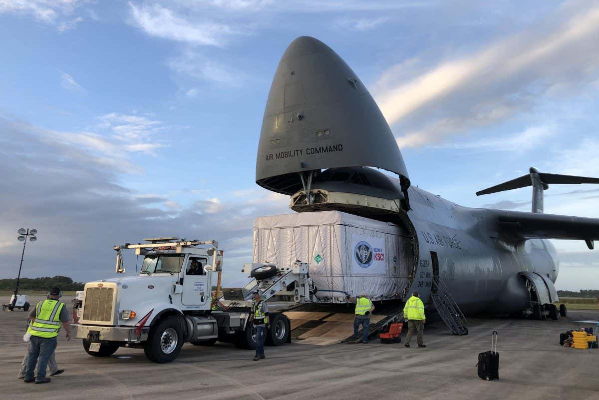 The shipping container holding the Geostationary Operational Environmental Satellite T (GOES-T) is unloaded from a United States Air Force C-5 cargo plane following its arrival at the Launch and Landing Facility runway at NASA?s Kennedy Space Center in Florida on Nov. 10, 2021. Teams then transported the satellite to an Astrotech Space Operations facility in nearby Titusville for prelaunch processing. A collaboration between NASA and the National Oceanic and Atmospheric Administration, GOES-T is scheduled to launch aboard a United Launch Alliance Atlas V rocket from Cape Canaveral Space Force Station on March 1, 2022. The launch is being managed by NASA?s Launch Services Program based at Kennedy, America?s multi-user spaceport.