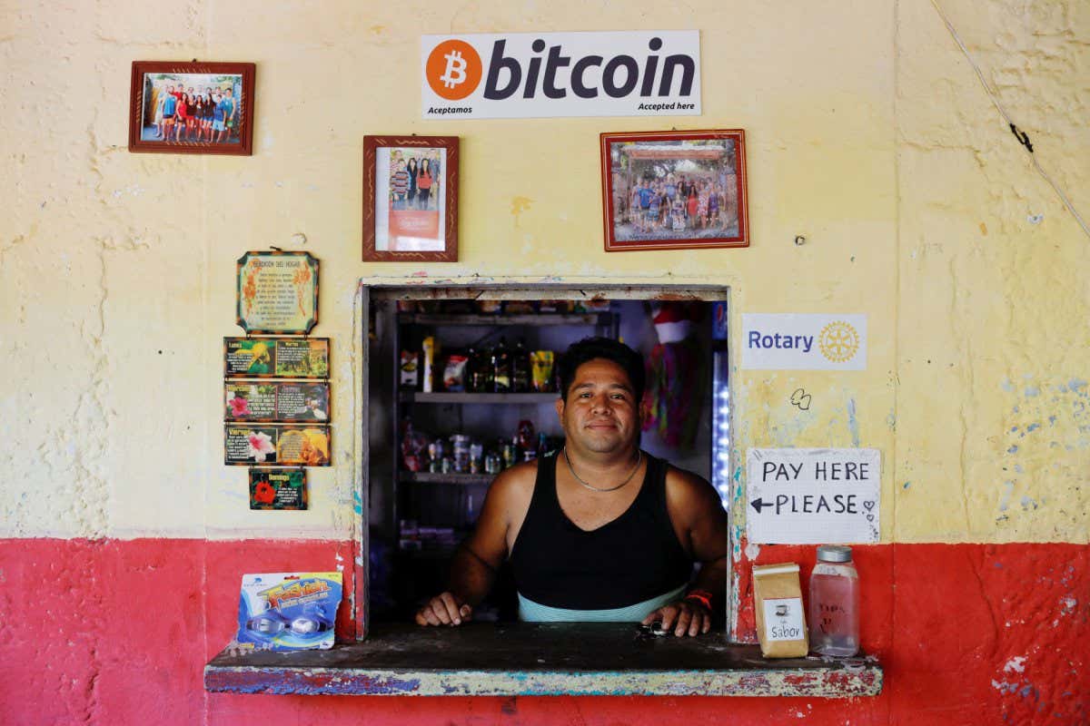 2G26J6E Roberto Carlos Silva, owner of La Zontena store, poses at his business where he accepts Bitcoins at El Zonte Beach in Chiltiupan, El Salvador June 8, 2021. REUTERS/Jose Cabezas