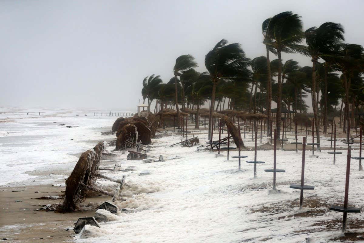 Debris litters a beach after cyclone Mekunu hit Salalah, Oman in May 2018