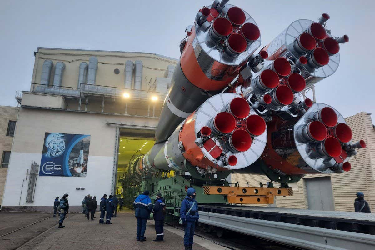 KAZAKHSTAN MARCH 2, 2022: A Soyuz-2.1b rocket booster with a Fregat upper stage carrying British OneWeb satellites is being transported from an assembling facility to a launch pad at the Baikonur Cosmodrome. The launch is scheduled for 5 March 2022 at 01:41 Moscow time. Roscosmos Press Office/TASS THIS IMAGE WAS PROVIDED BY A THIRD PARTY. EDITORIAL USE ONLY (Photo by Roscosmos Press Office\TASS via Getty Images)