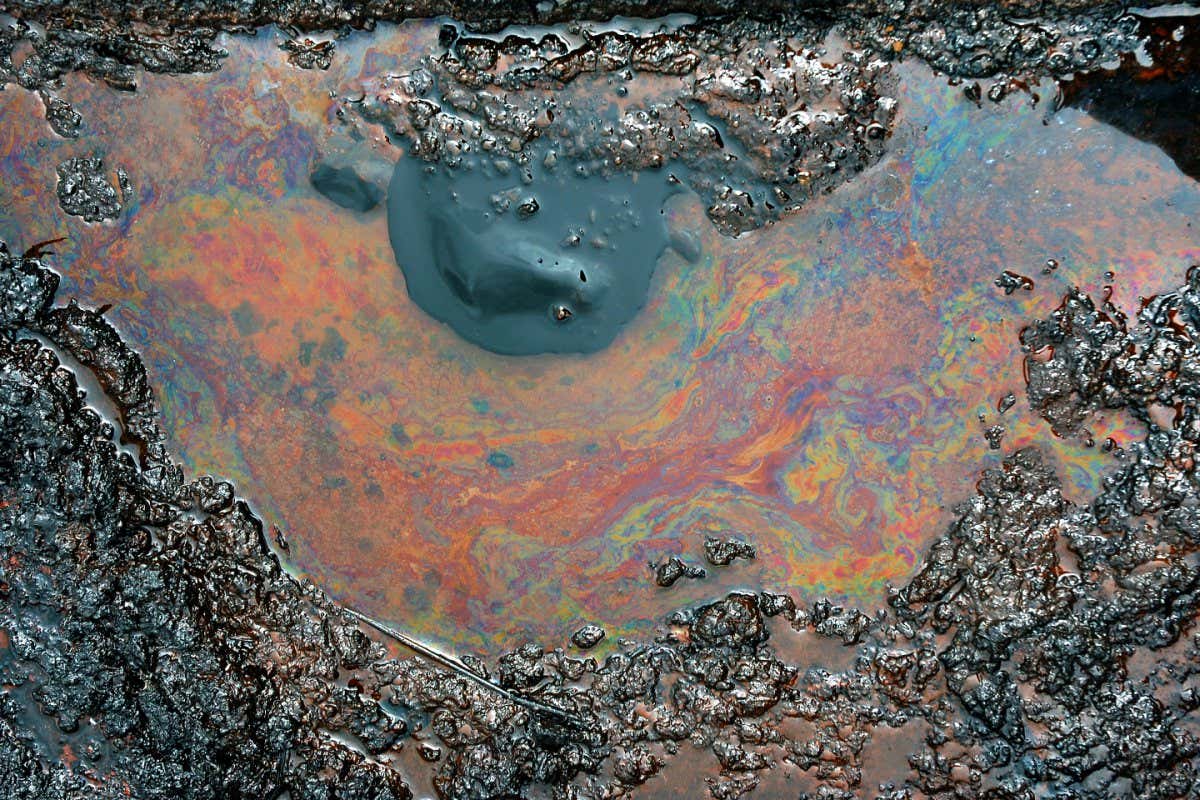 Spills of crude oil on the soil surface - environment pollution.; Shutterstock ID 559184992; purchase_order: -; job: -; client: -; other: -