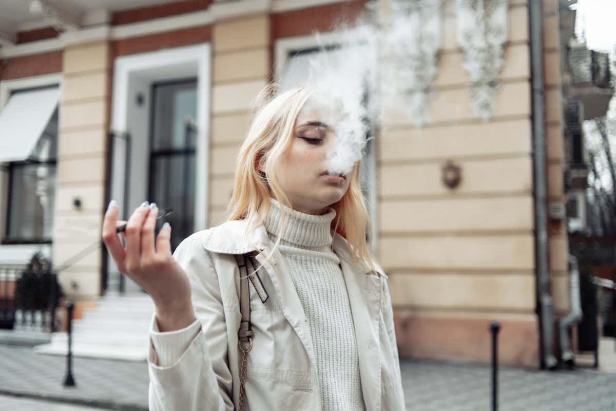 young woman vaping