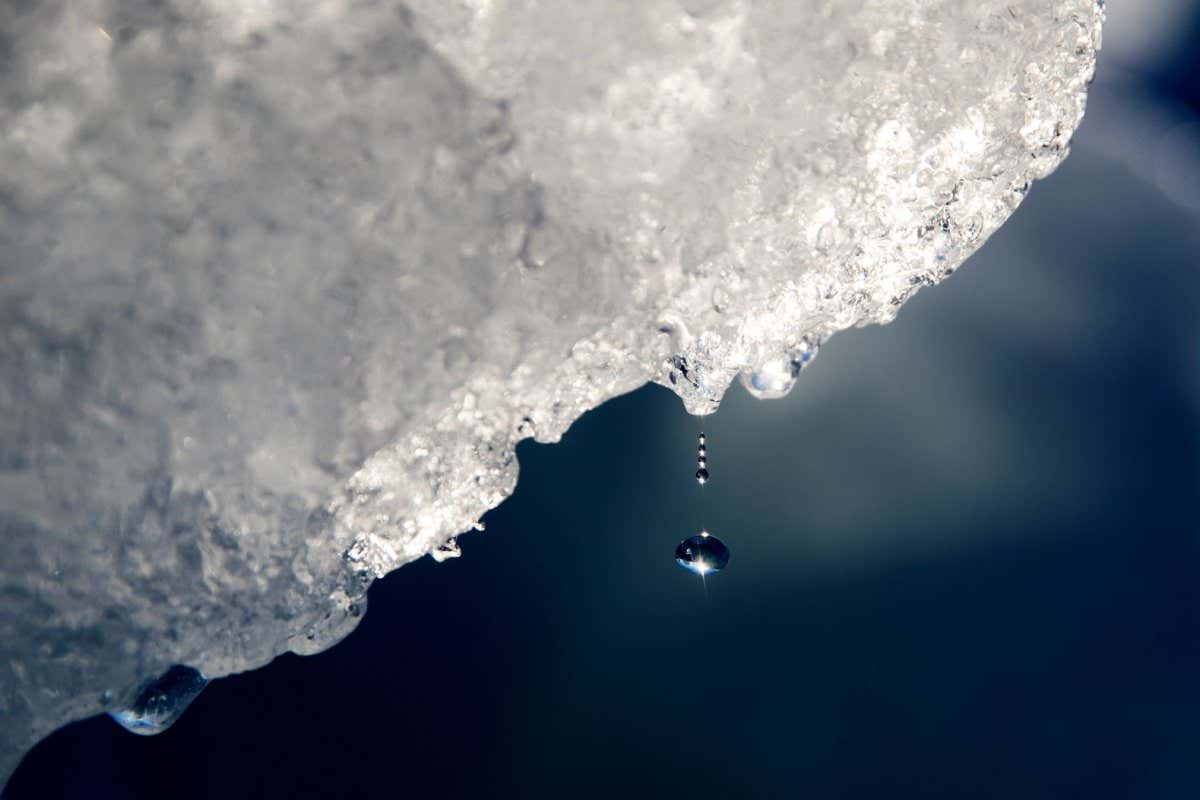Mandatory Credit: Photo by David Goldman/AP/Shutterstock (12856458a) A drop of water falls off an iceberg melting in the Nuup Kangerlua Fjord near Nuuk in southwestern Greenland, . Earth's poles are undergoing simultaneous freakish extreme heat with parts of Antarctica more than 70 degrees (40 degrees Celsius) warmer than average and areas of the Arctic more than 50 degrees (30 degrees Celsius) warmer than average Hot Poles, Nuup Kangerlua Fjord, Greenland