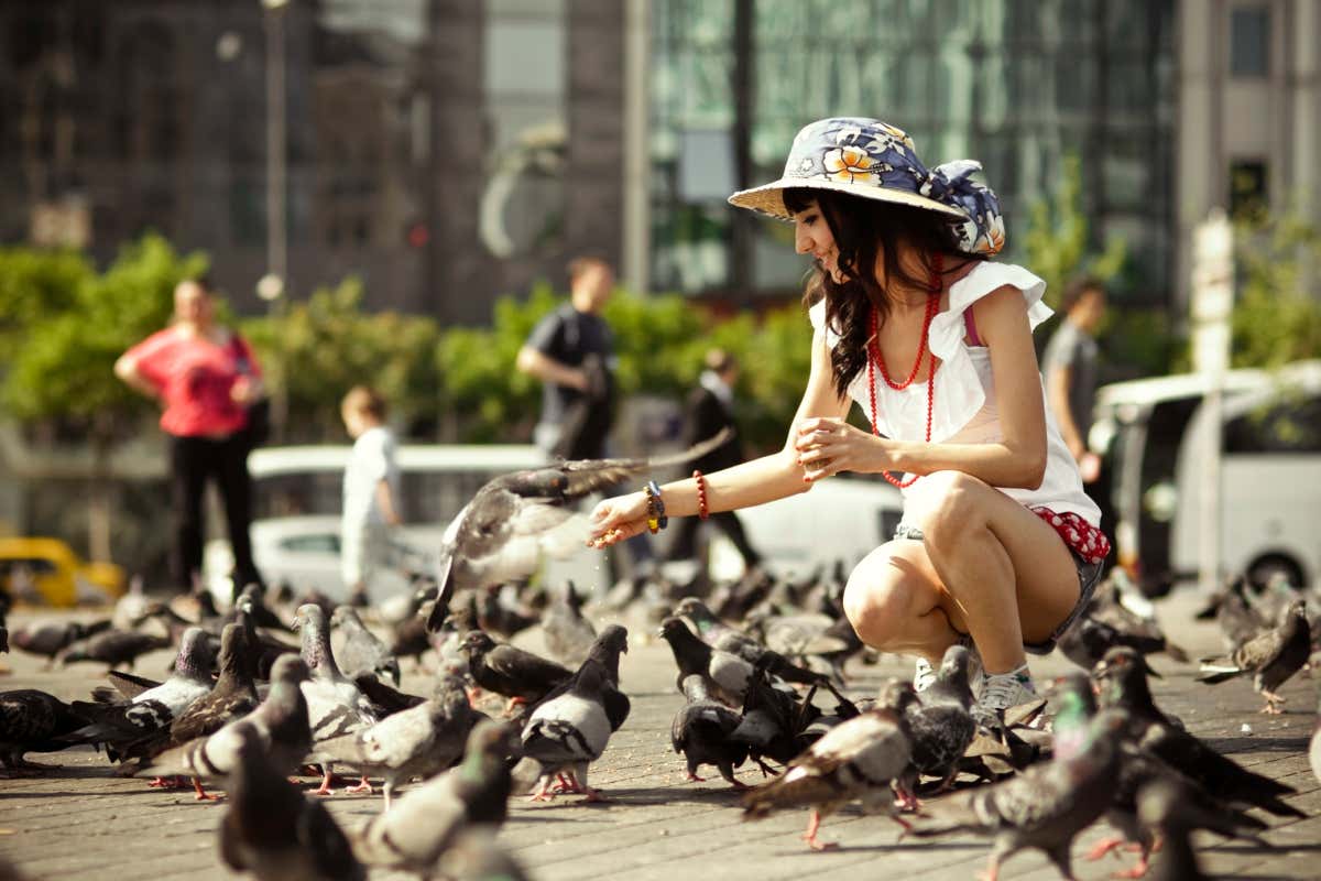 woman with pigeons