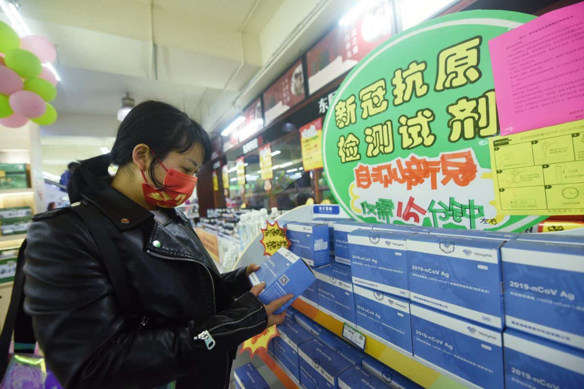 HANGZHOU, CHINA - MARCH 21: A citizen purchases COVID-19 antigen rapid test kits for self-testing at a drug store on March 21, 2022 in Hangzhou, Zhejiang Province of China. (Photo by Long Wei/VCG via Getty Images)