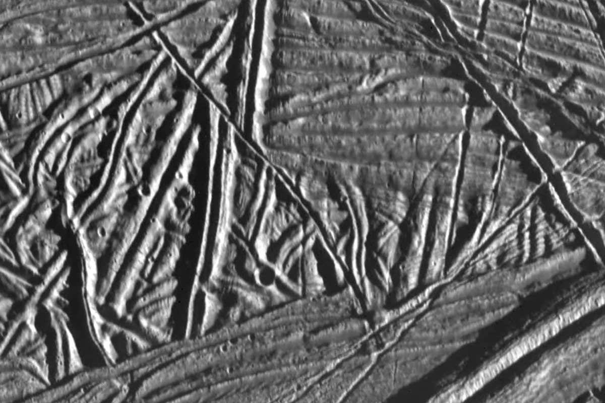 This high resolution image of the icy crust of Europa, one of Jupiter's moons, reveals a surface criss-crossed by multiple sets of ridges and fractures