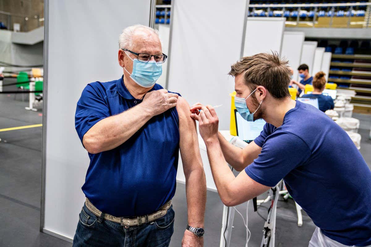 A person receives their covid-19 vaccine in Frederikshavn in Jutland, Denmark, on 12 April 2021