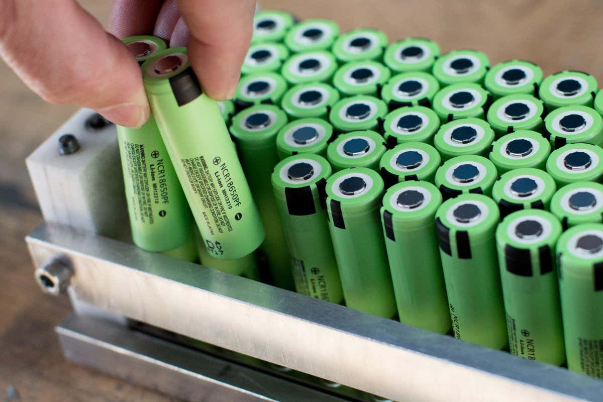 Lithium-ion battery cells being inserted into a pack at the Johammer e-mobility GmbH electric motorbike factory in Bad Leonfelden, Austria, in 2016