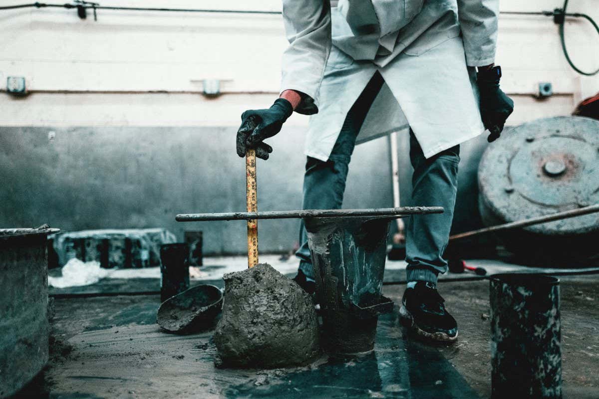 The AI-generated formulas undergo slump testing at the UIUC lab as part of their initial performance assessment and refinement.