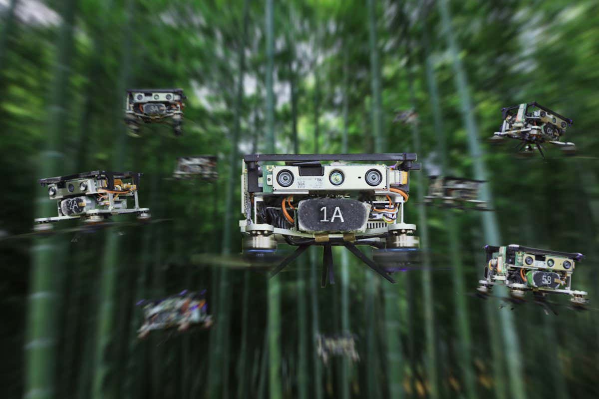 Watch a swarm of drones navigate a forest without crashing
