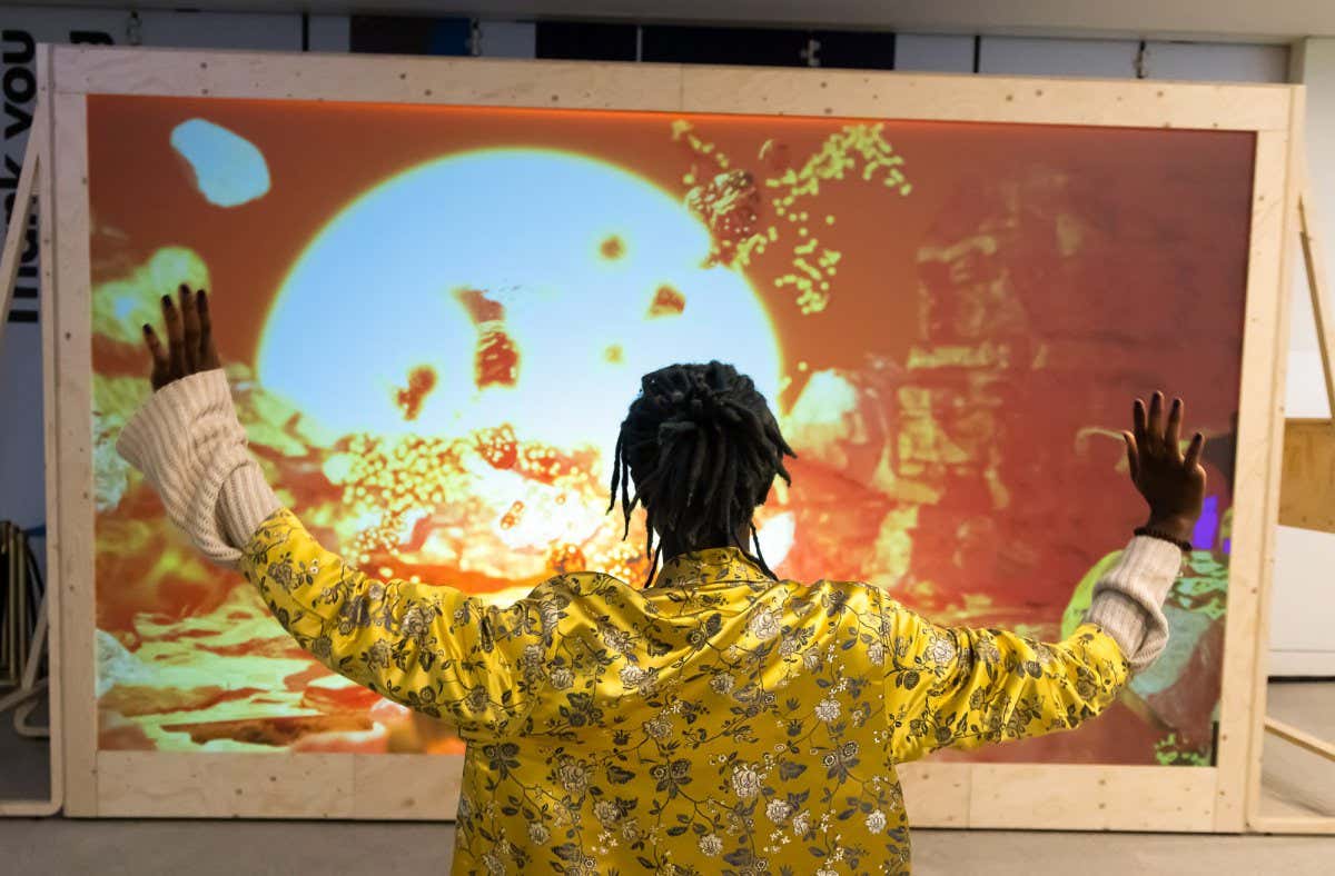 LONDON, ENGLAND - MAY 02: Invited guests during a preview of the 'Our Time On Earth' exhibition at The Curve, Barbican Centre on May 02, 2022 in London, England. The exhibition runs from 5th May 2022 to 29th Aug 2022. (Photo by Tim P. Whitby/Tim P. Whitby/Getty Images for Barbican Centre)
