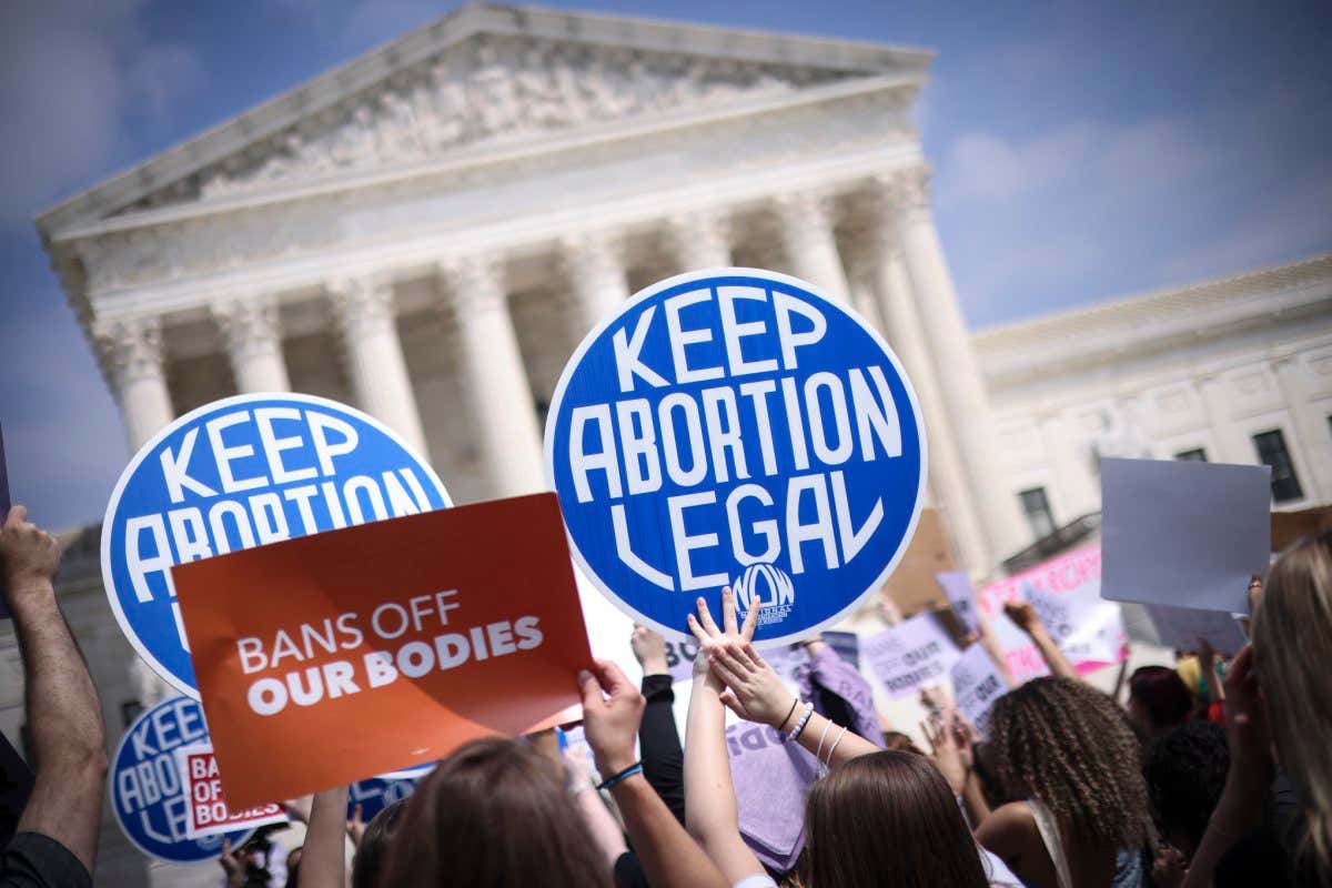 WASHINGTON, DC - MAY 03: Pro-choice and anti-abortion activists demonstrate in front of the U.S. Supreme Court Building on May 03, 2022 in Washington, DC. In a leaked initial draft majority opinion obtained by Politico and authenticated by Chief Justice John Roberts, Supreme Court Justice Samuel Alito wrote that the cases Roe v. Wade and Planned Parenthood of Southeastern Pennsylvania v. Casey should be overturned, which would end federal protection of abortion rights across the country. (Photo by Win McNamee/Getty Images)