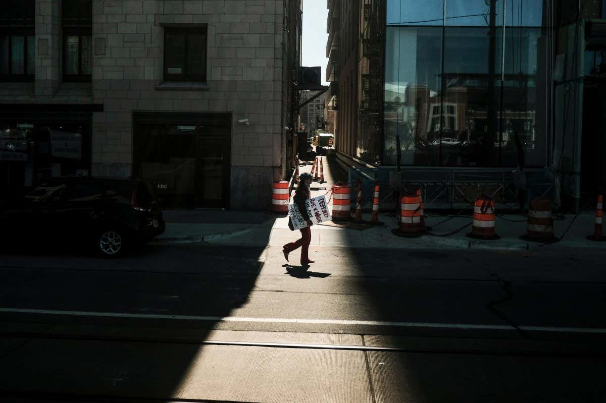 Mandatory Credit: Photo by Matthew Hatcher/SOPA Images/Shutterstock (12930620ac) A pro-choice protester disperses after a protest for Roe v Wade, in Detroit, Michigan. Pro-choice activists march through the streets of downtown Detroit, Michigan to protest a leaked document that showed that the U.S Supreme Court was prepared to overturn Roe v. Wade. Roe v Wade protest in Detroit, US - 07 May 2022