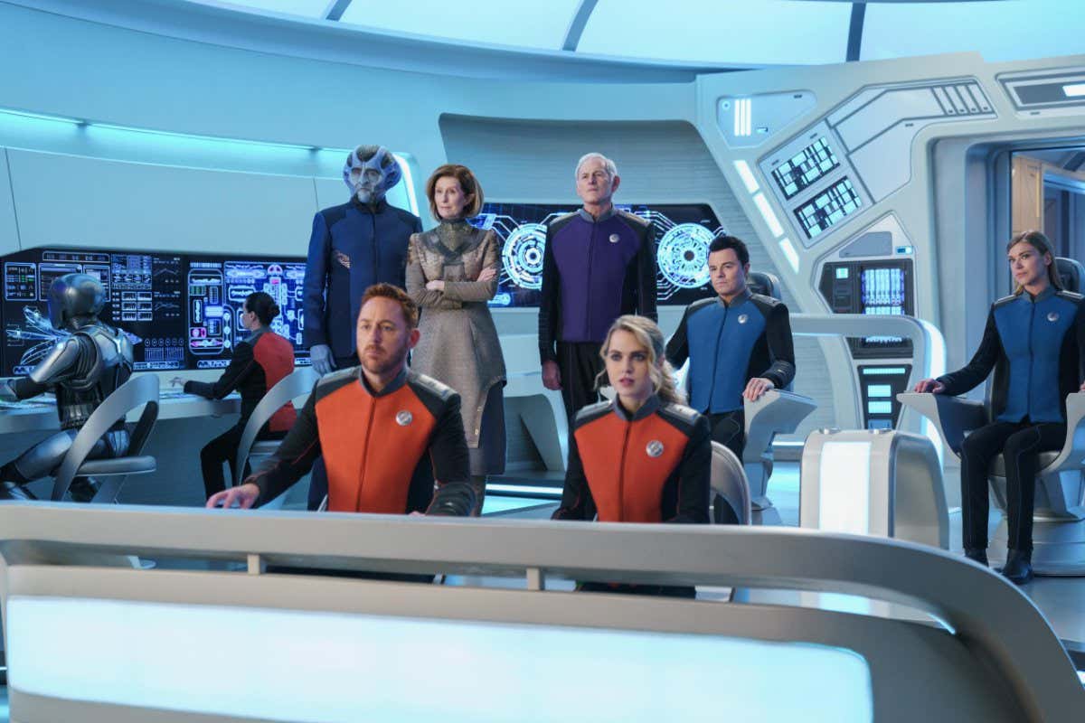 The Orville: New Horizons -- Season 3 - Seth MacFarlane???s epic space adventure series ???The Orville??? returns exclusively as a Hulu original series. Set 400 years in the future, ???The Orville: New Horizons??? finds the crew of the U.S.S. Orville continuing their mission of exploration, as they navigate both the mysteries of the universe and the complexities of their own interpersonal relationships. The ensemble cast includes MacFarlane, Adrianne Palicki, Penny Johnson Jerald, Scott Grimes, Peter Macon, J. Lee, Mark Jackson, Chad L. Coleman, Jessica Szohr and Anne Winters. ???The Orville: New Horizons??? is produced by 20th Television and Fuzzy Door. The series was created and written by Seth MacFarlane. MacFarlane, Brannon Braga, David A. Goodman, Jon Cassar, Jason Clark and Howard Griffith serve as executive producers. President Alcuzan (Bruce Boxleitner), Lt. Gordon Malloy (Scott Grimes), Speria Balask (Lisa Banes), Admiral Halsey (Victor Garber), Charly Burke (Anne Winters), Capt. Ed Mercer (Seth MacFarlane), Cmdr. Kelly Grayson (Adrianne Palicki) and Isaac (Mark Jackson), shown. (Photo by: Michael Desmondl/Hulu)