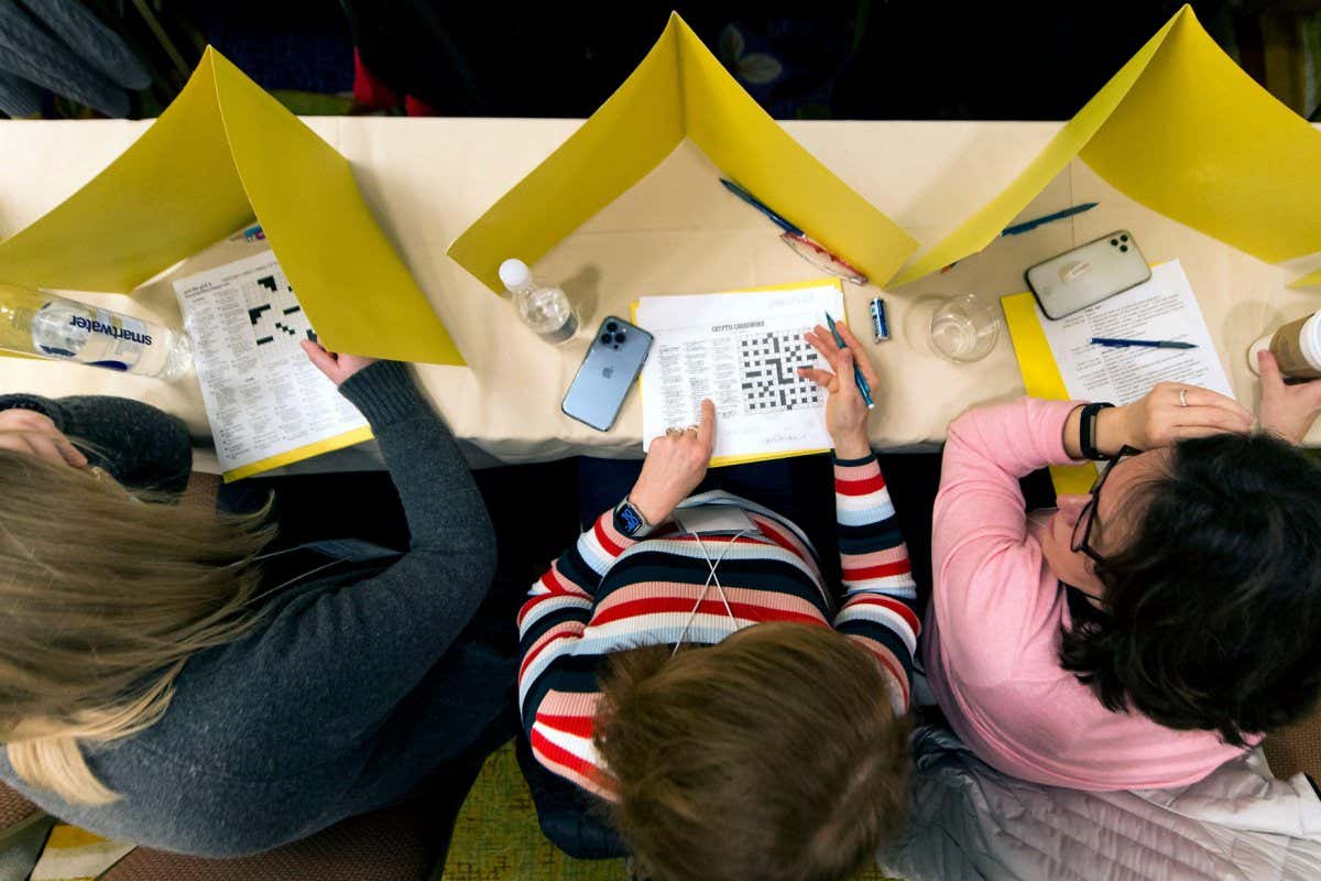 2J2KT94 Stamford, Connecticut, USA. 02nd Apr, 2022. Solvers warm up before the start of play at the 44th Annual American Crossword Puzzle Tournament. The ACPT, founded in 1978 by New York Times puzzle master Will Shortz, is back this year as an in-person event after a cancellation in 2020 and a virtual competition last year.(Credit Image: ? Brian Cahn/ZUMA Press Wire)