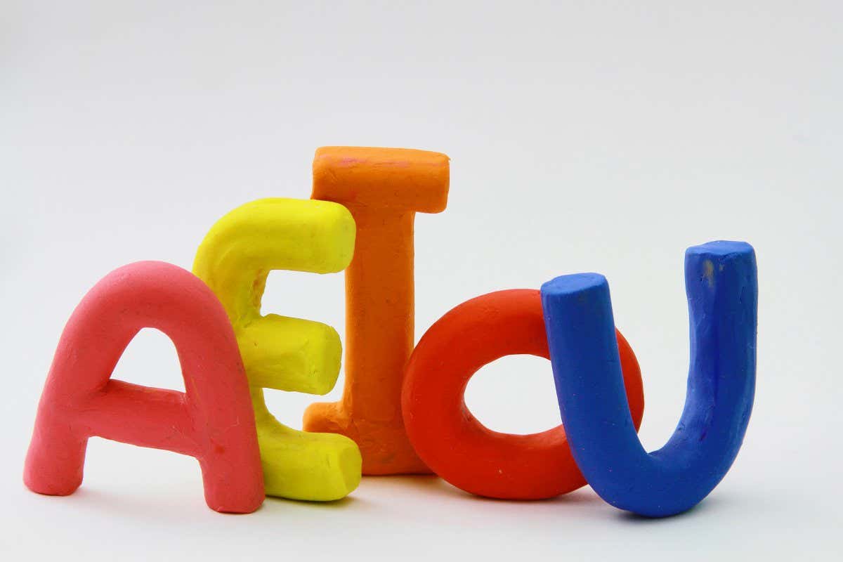 colored vowels in clay with white background; Shutterstock ID 1579046926; purchase_order: -; job: -; client: -; other: -