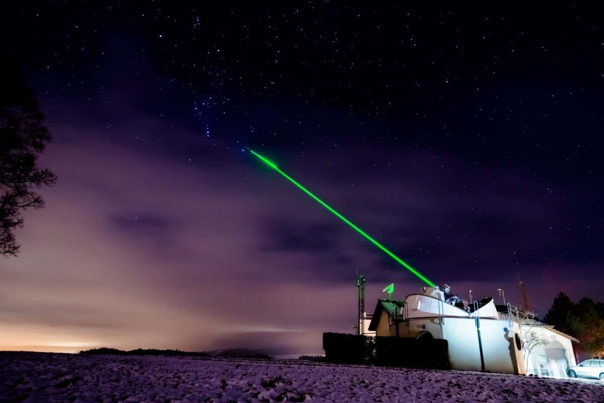 DRMN7A BERN - JAN 22 2014: Zimmerwald observatoty is tracking sattelites with laser on January 22, 2014, Bern, Switzerland.