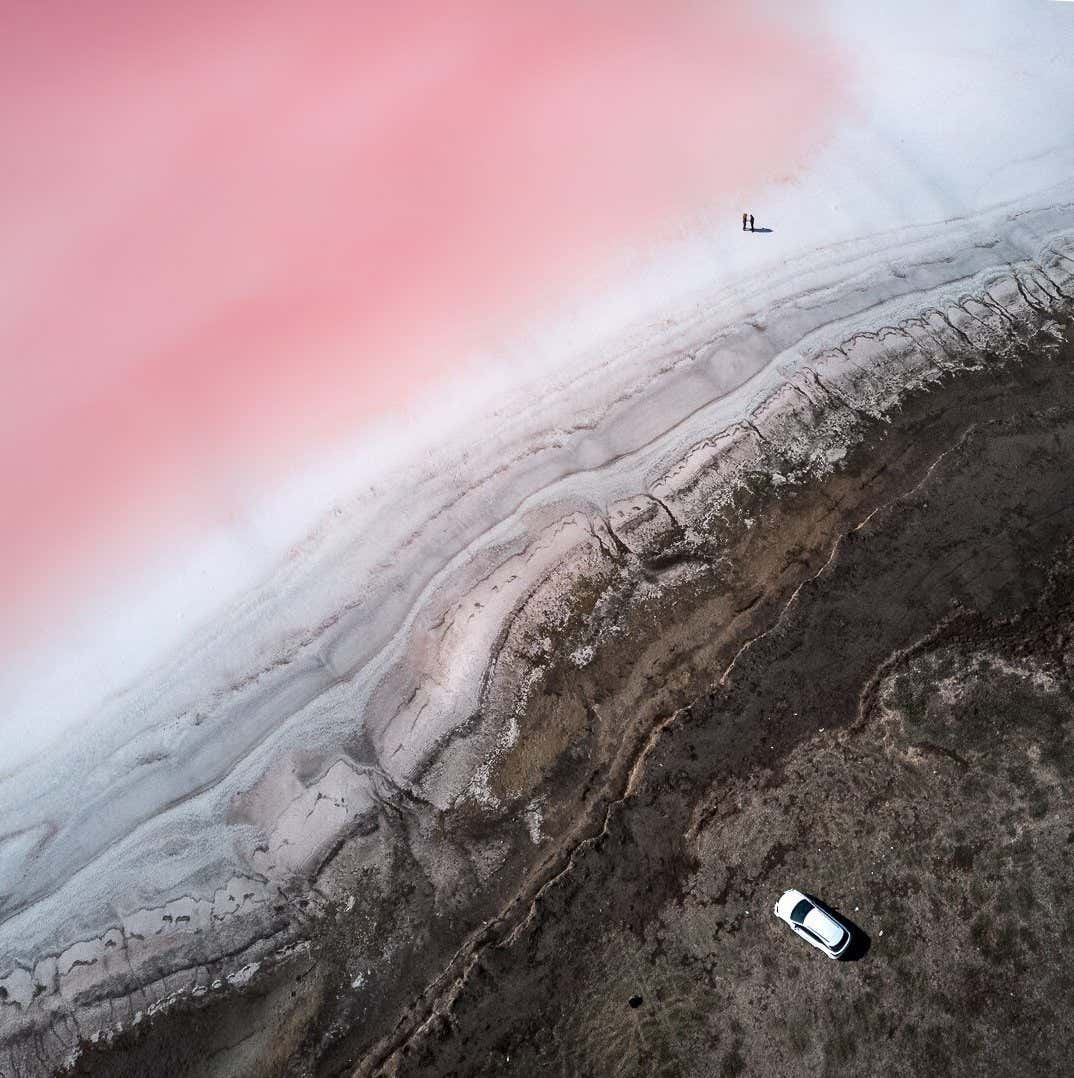 YEVHEN SAMUCHENKO, AT THE PINK PLANET, 1 CAR AND 2 PEOPLE, 2019. Shortlisted for Earth Photo 2022.