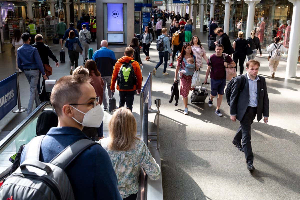 Commuters at St Pancras International train station in London, England, in May