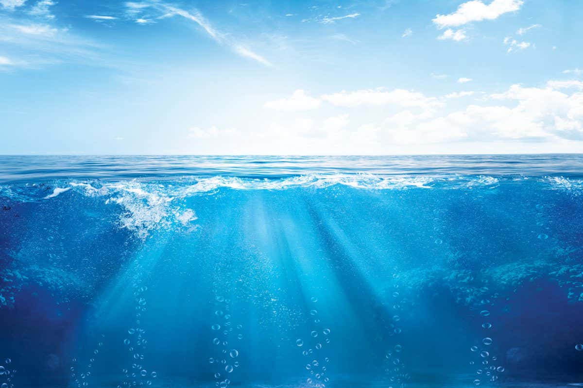 Light bursting through the ocean