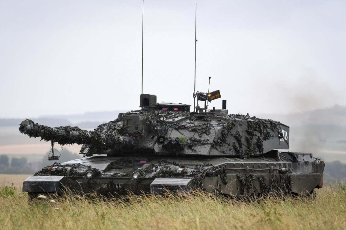 SALISBURY, ENGLAND - Challenger 2 Main Battle Tank during a training exercise on Salisbury Plain Training Area in Salisbury, England. 5 RIFLES Battlegroup prepares for deployment on Op CABRIT in Estonia as part of the NATO enhanced Forward Presence later this year. 5 RIFLES Battlegroup is trialing a new concept of training or Operational Readiness Model (ORM) on behalf of The Field Army to ensure they are mission ready. Additionally, due to the Coronavirus pandemic, training methods have been adjusted with innovative measures introduced to ensure that training isn't compromised and expectations and operational outputs lowered. (Photo by Finnbarr Webster/Getty Images)