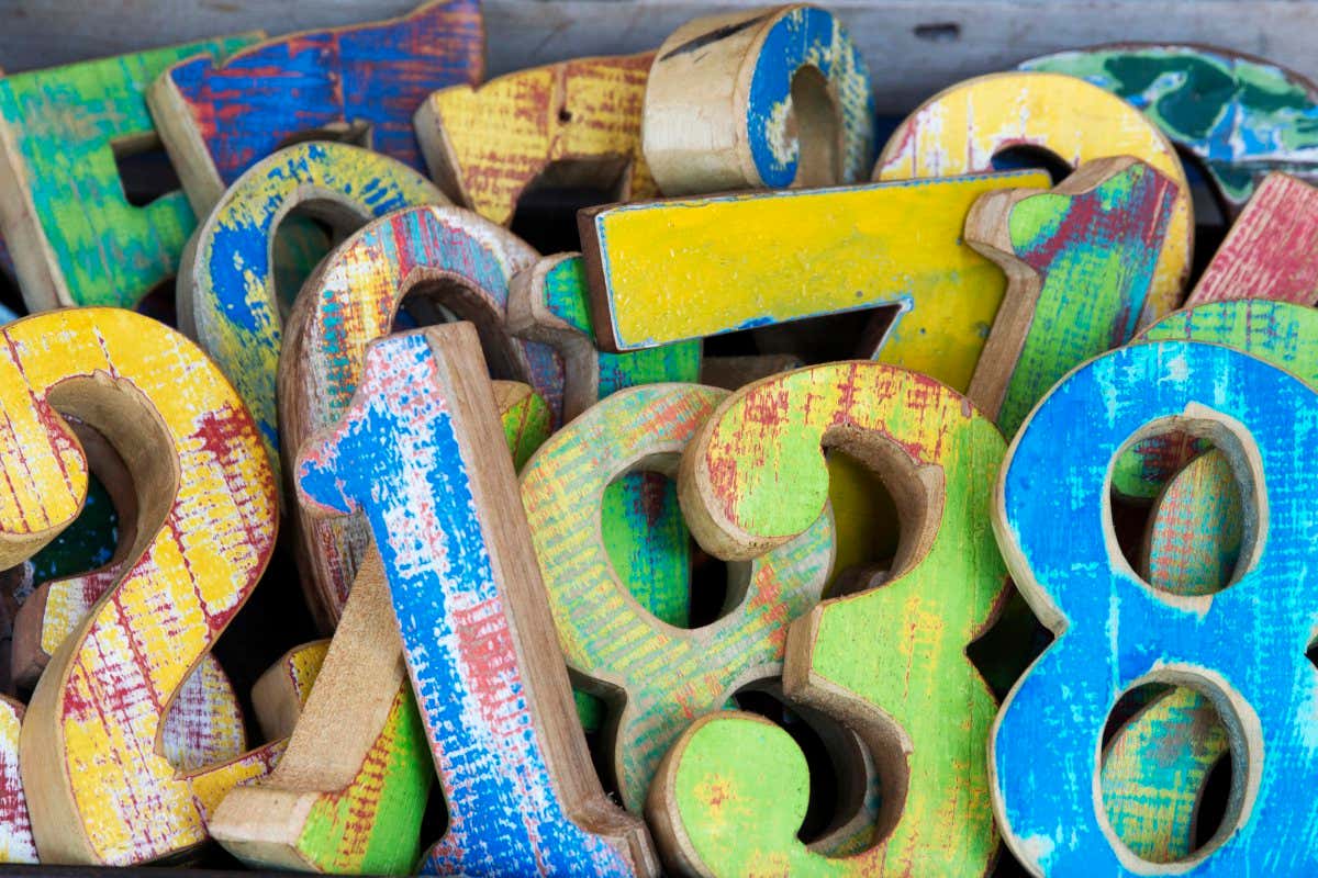 Portobello street, variety of wooden numbers for sale.