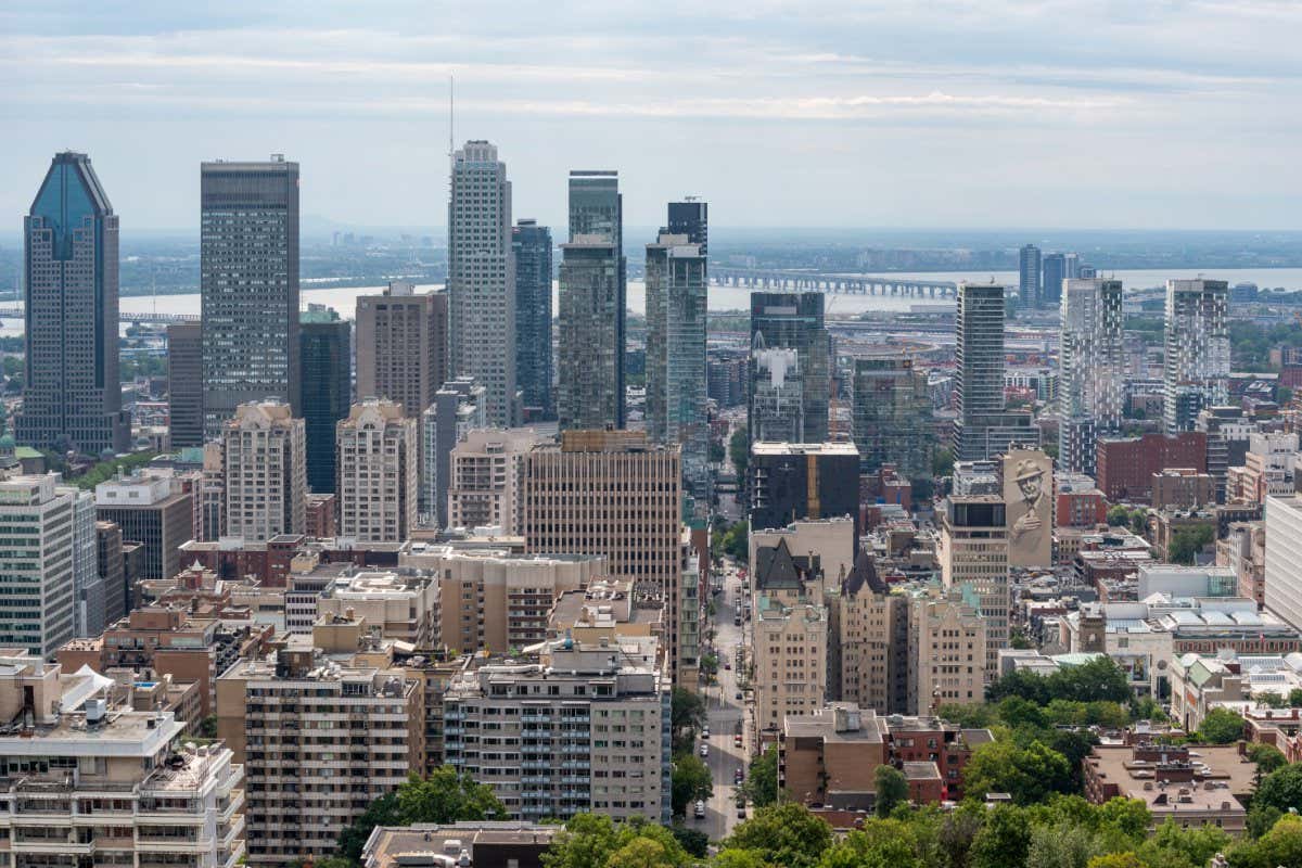 Montreal, Quebec, Canada ??? 14 August 2021 ??? View of the Montreal city downtown from the belvedere Kondiaronk of the Mont Royal park.