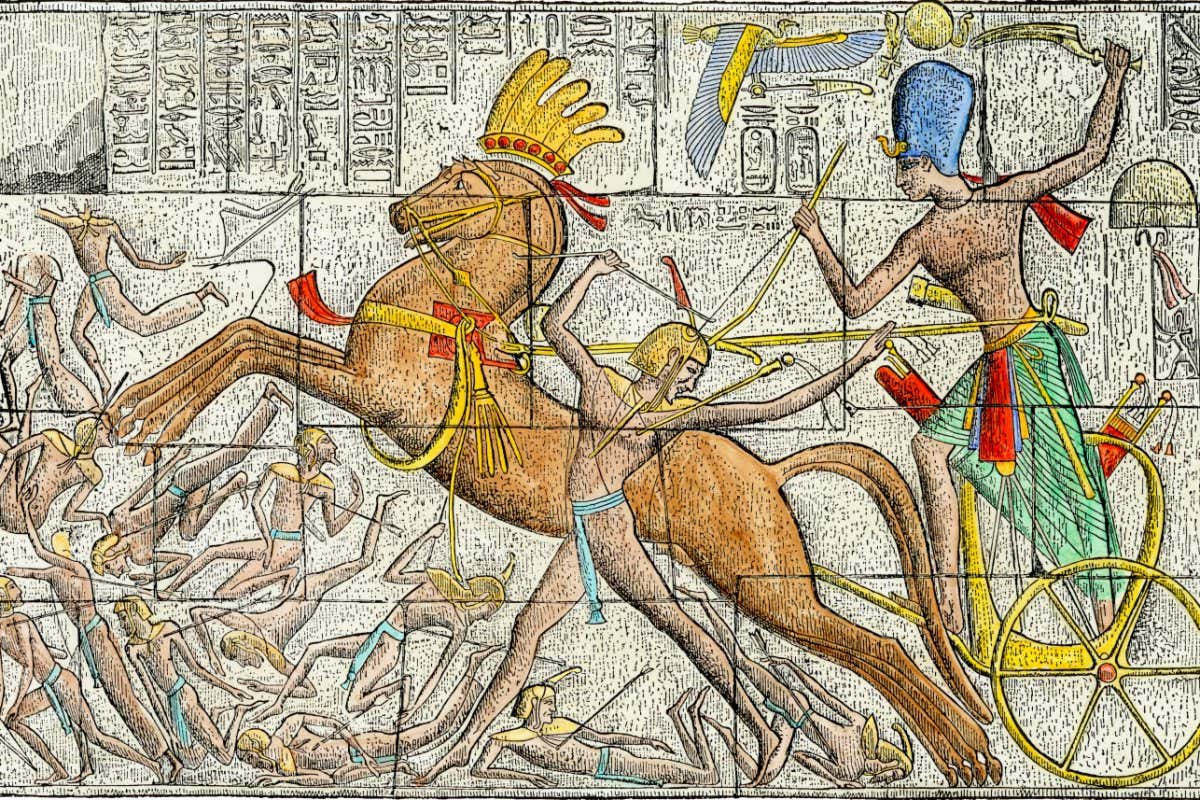 MF0B5A Pharaoh driving a chariot in battle, ancient Egypt. Hand-colored engraving of a bas-relief