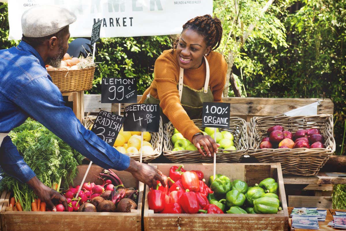 African couple owner fresh grocery organic shop; Shutterstock ID 615928364; purchase_order: -; job: -; client: -; other: -