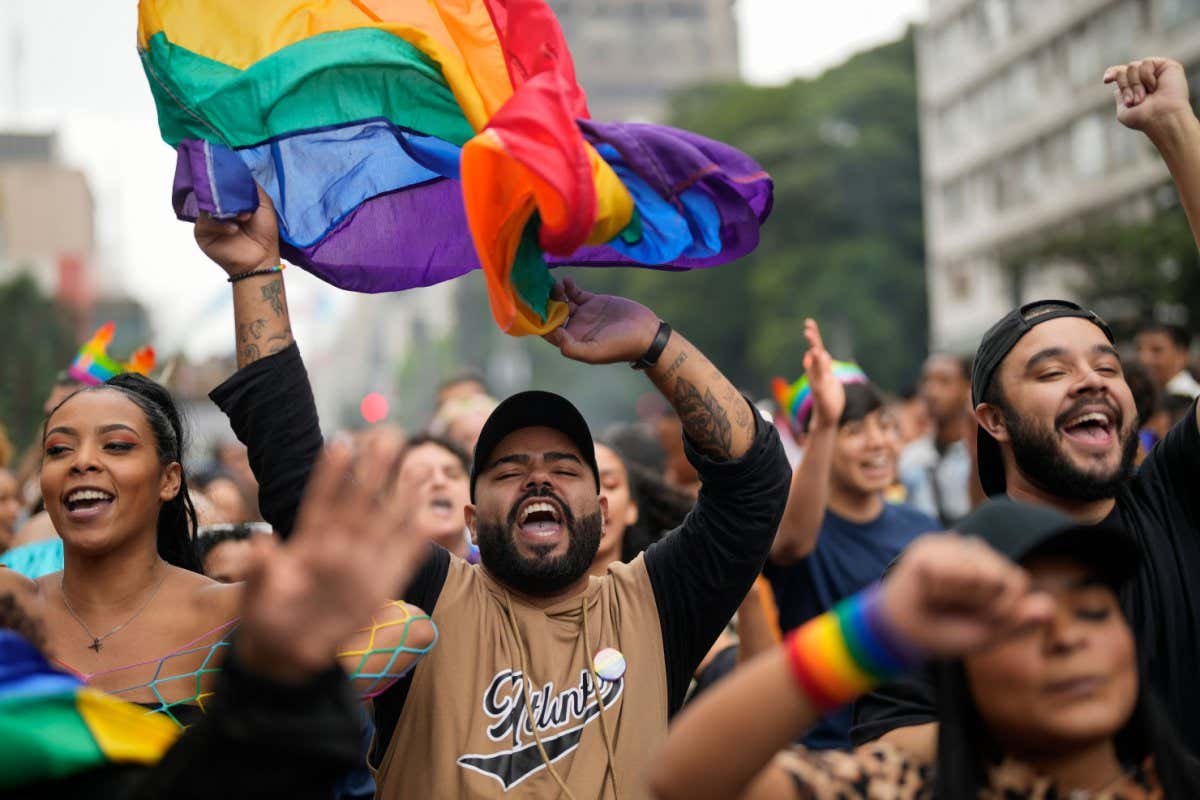 Mandatory Credit: Photo by Andre Penner/AP/Shutterstock (12992306c) Revelers dance during the annual Gay Pride Parade in Sao Paulo, Brazil Gay Pride Parade, Sao Paulo, Brazil - 19 Jun 2022