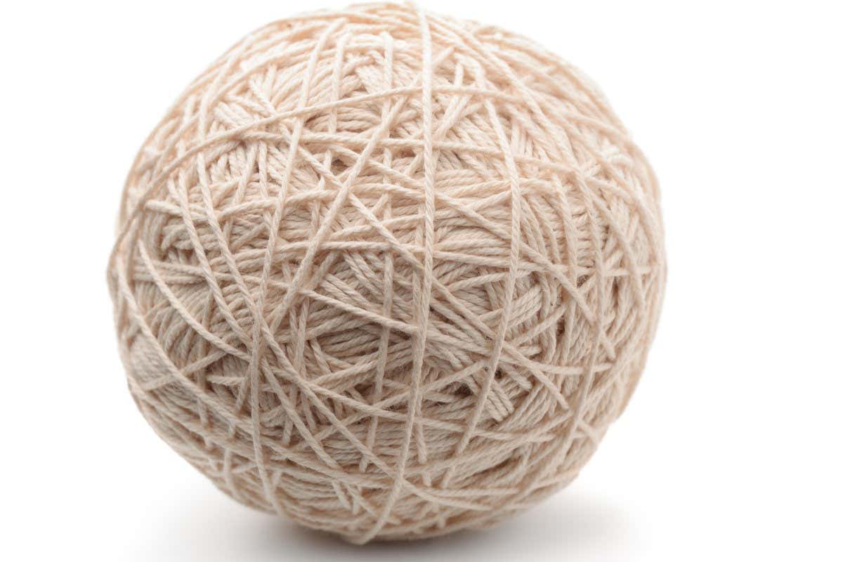 FTTG61 Ball of white heavy thread isolated on white