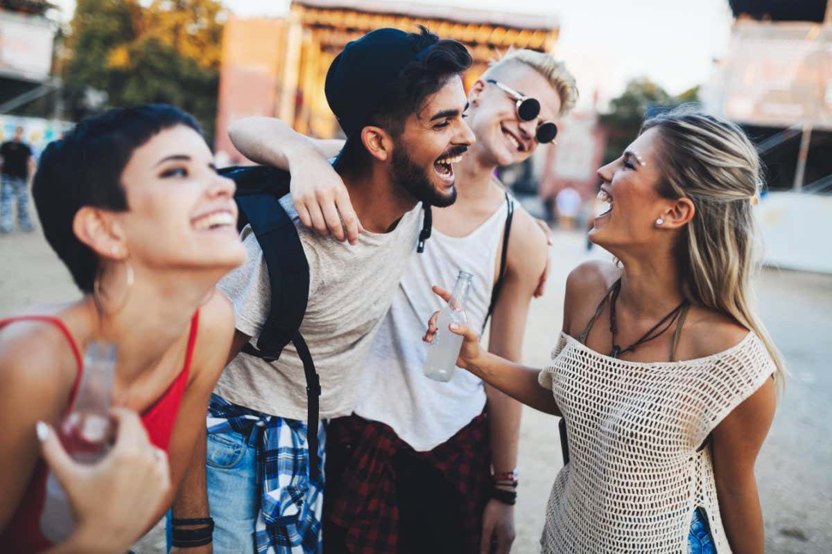Group of friends having fun time at music festival