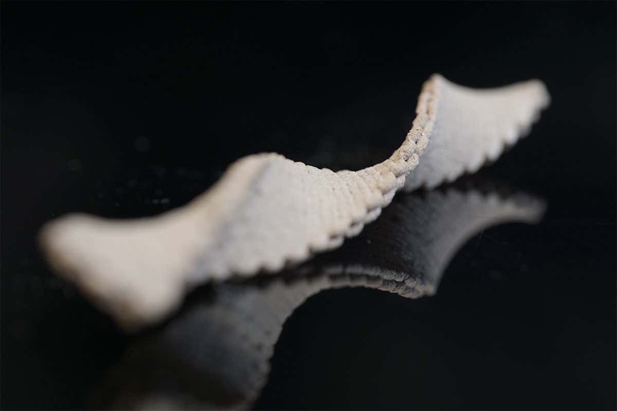 Wood ink printed as a flat rectangle forms a helix shape after drying and solidifying