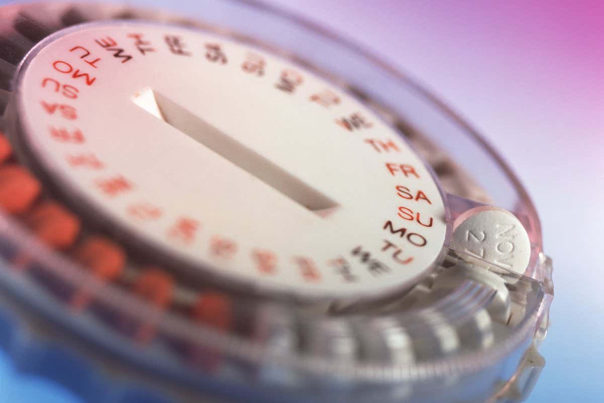 ^BHormone replacement therapy.^b Close-up of Hormone Replacement Therapy (HRT) pills in a circular dispenser. HRT pills are synthetic hormones used to treat menopausal women. They counteract the hormone deficiency that occurs at menopause. These pills contain oestrogen, and often progestogen, drugs. HRT helps to prevent ^Iosteoporosis,^i ^Iatherosclerosis^i and ^Iatrophic vaginitis^i (where the vagina becomes thin and dry). Pills are taken daily on a monthly basis to coincide with the menstrual cycle. Adverse effects include nausea, tenderness of the breasts, fluid retention and leg cramps.