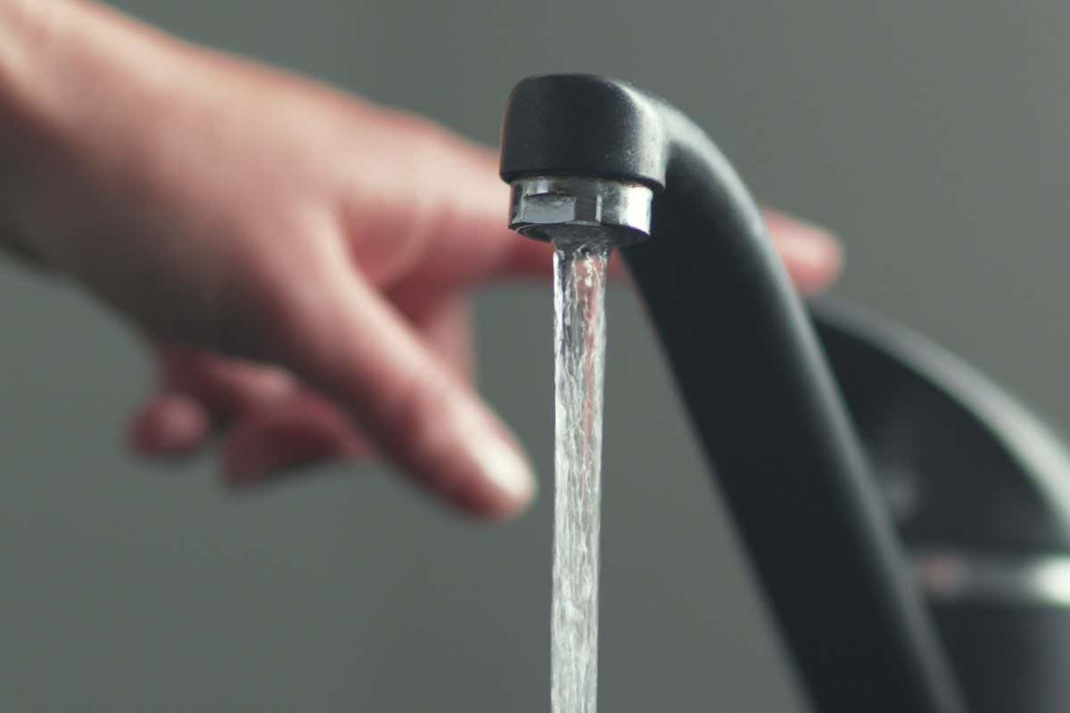 Water flowing from a tap