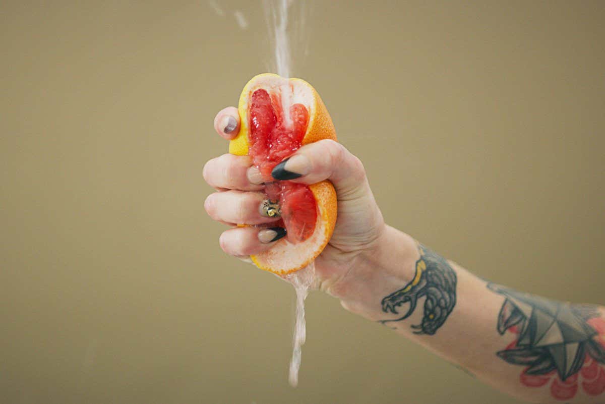 Liquid squirting from a grapefruit