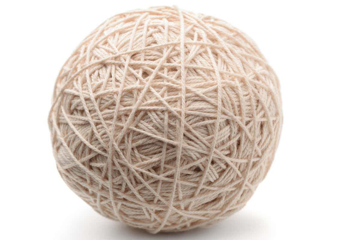 FTTG61 Ball of white heavy thread isolated on white