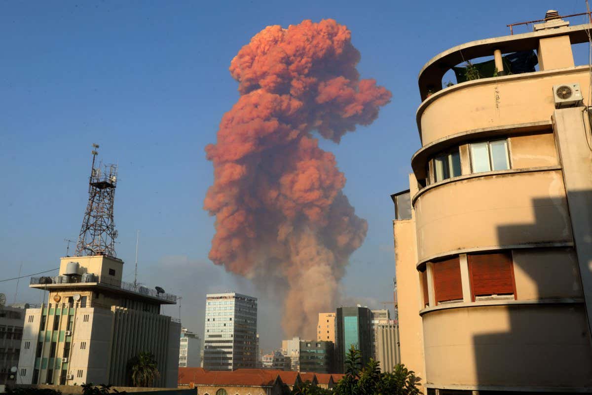 TOPSHOT - A picture shows the scene of an explosion in Beirut on August 4, 2020. - A large explosion rocked the Lebanese capital Beirut on August 4, an AFP correspondent said. The blast, which rattled entire buildings and broke glass, was felt in several parts of the city. (Photo by Anwar AMRO / AFP) (Photo by ANWAR AMRO/AFP via Getty Images)