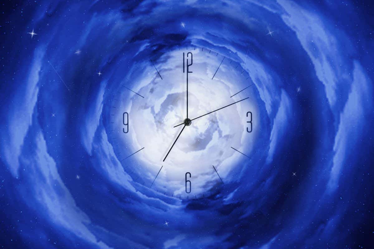 Clock in the starry cosmic sky. Leaving time. Time and space. Time concept. Abstraction.; Shutterstock ID 1962091081; purchase_order: -; job: -; client: -; other: -