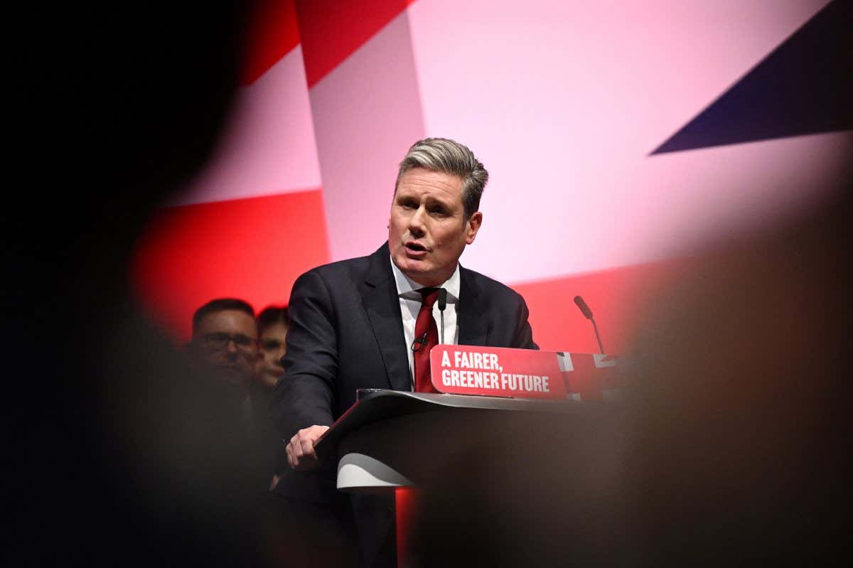 Britain's main opposition Labour Party leader Keir Starmer delivers his keynote address to delegates third day of the annual Labour Party conference in Liverpool, north west England, on September 27, 2022. (Photo by Oli SCARFF / AFP) (Photo by OLI SCARFF/AFP via Getty Images)