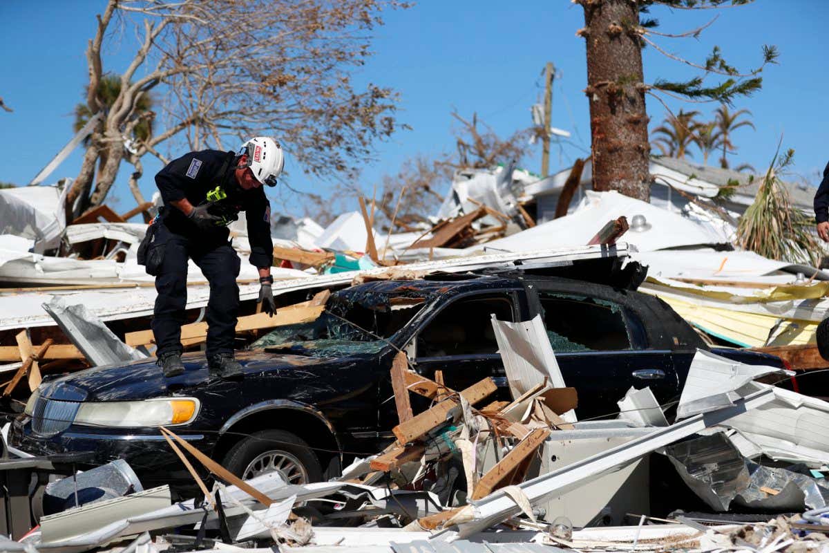 Car buried under rubble