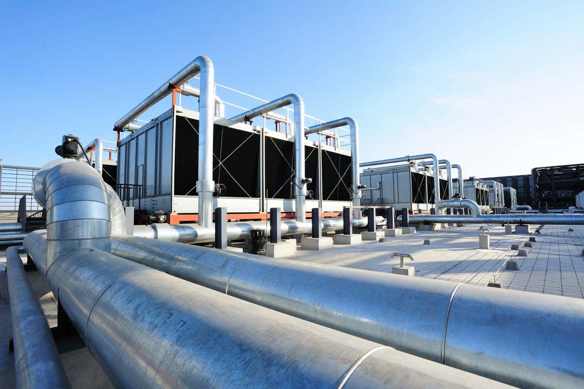 Sets of cooling towers in data center building.; Shutterstock ID 368730815; purchase_order: -; job: -; client: -; other: -