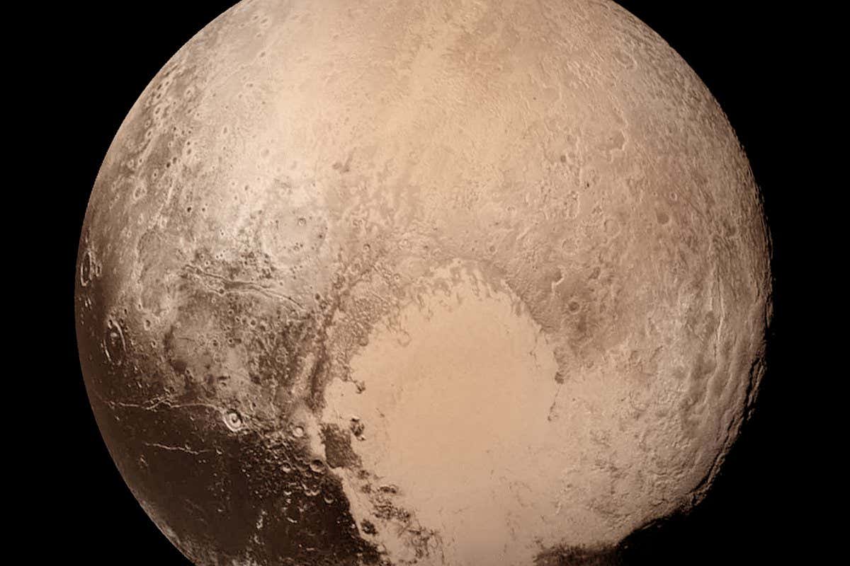Pluto nearly fills the frame in this image from the Long Range Reconnaissance Imager (LORRI) aboard NASA's New Horizons spacecraft, taken on July 13, 2015, when the spacecraft was 476,000 miles (768,000 kilometers) from the surface. This is the last and most detailed image sent to Earth before the spacecraft's closest approach to Pluto on July 14. The color image has been combined with lower-resolution color information from the Ralph instrument that was acquired earlier on July 13.