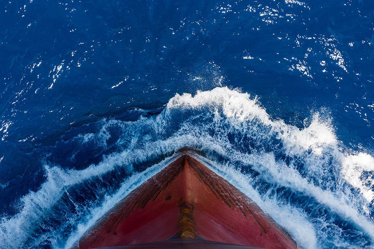Ship's bow, moving through the waves to her destination
