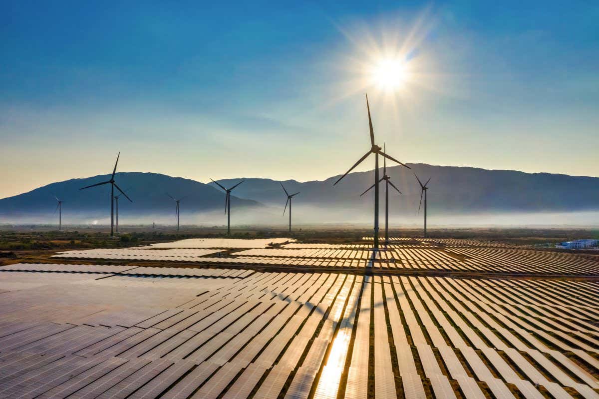 Aerial view of windmill and Solar panel, photovoltaic, alternative electricity source - concept of sustainable resources on a sunny day, Bac Phong, Thuan Bac, Ninh Thuan, Vietnam; Shutterstock ID 1718281252; purchase_order: -; job: -; client: -; other: -