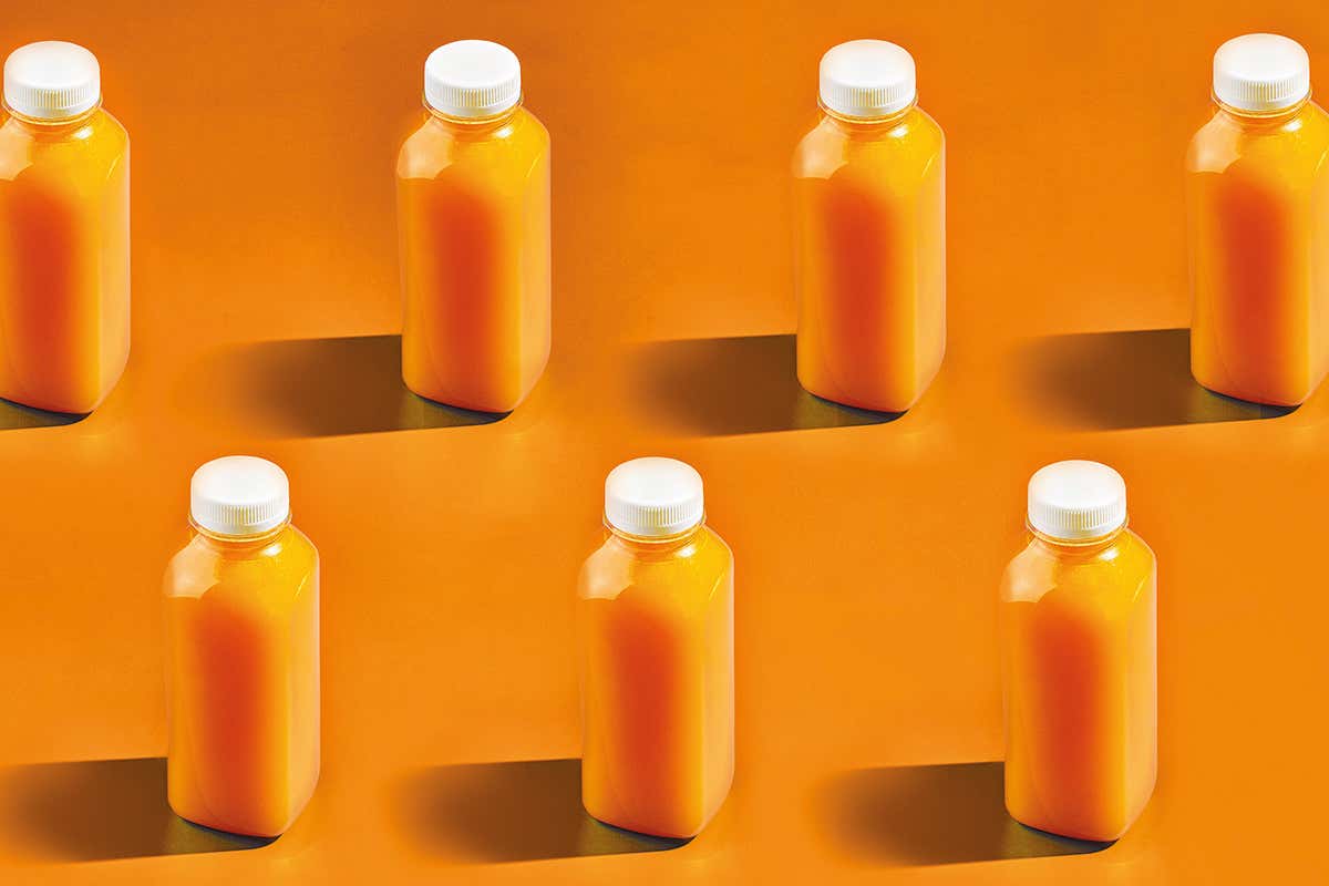 Orange bottles on an orange background
