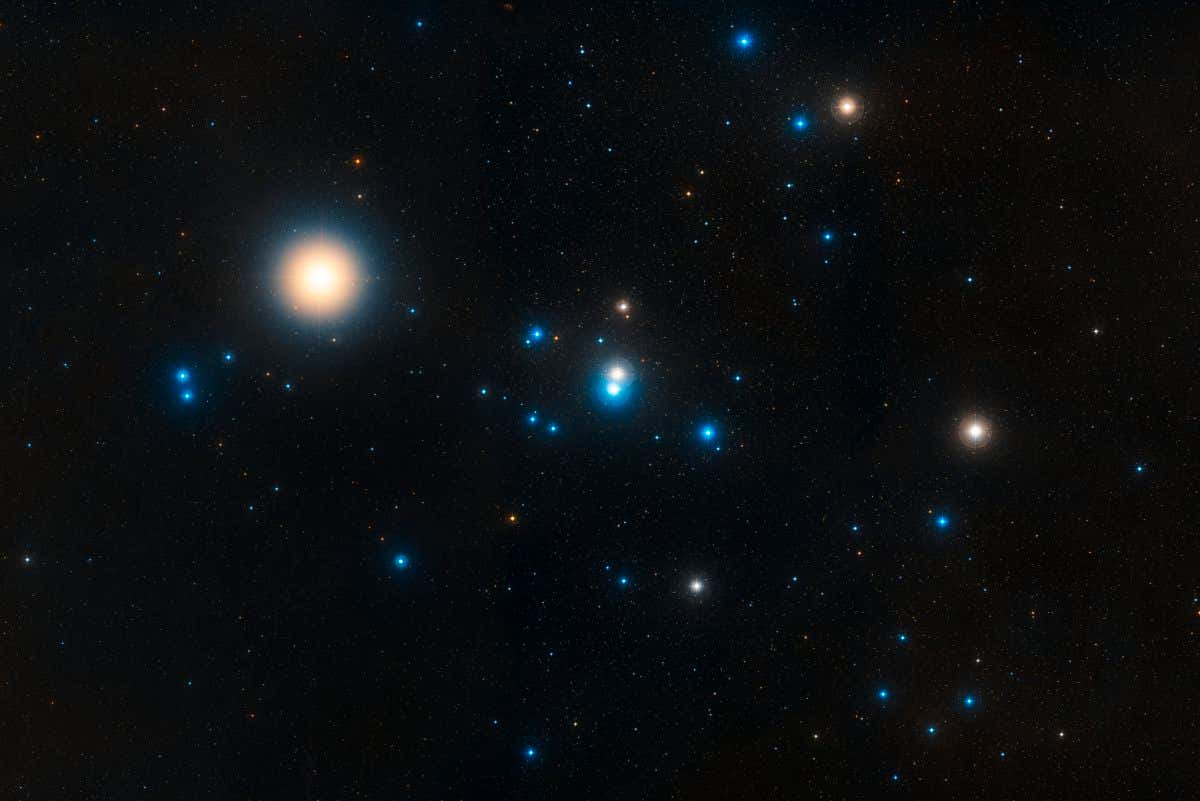 This image shows the Hyades star cluster, the nearest cluster to us. The Hyades cluster is very well studied due to its location, but previous searches for planets have produced only one. A new study led by Jay Farihi of the University of Cambridge, UK, has now found the atmospheres of two burnt-out stars in this cluster ??? known as white dwarfs ??? to be ???polluted??? by rocky debris circling the star. Seeing evidence of asteroids points to the possibility of Earth-sized planets in the same system, as asteroids are the building blocks of major planets. Planet-forming processes are inefficient, and spawn many times more small bodies than large bodies ??? but once rocky embryos the size of asteroids are built, planets are sure to follow.